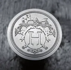 Plaquette H